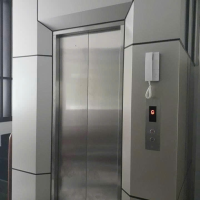 Mẫu Thang Máy Ốp Inox Tường